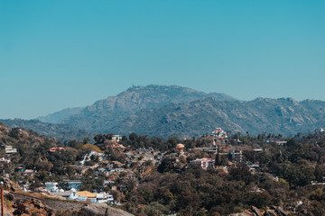 Fototapeta na wymiar View of the Mount Abu city besides the mountains at Mount Abu in Rajasthan, India