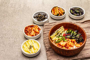Traditional Korean spicy soup with kimchi, tofu, vegetables. Hot dish for healthy meal