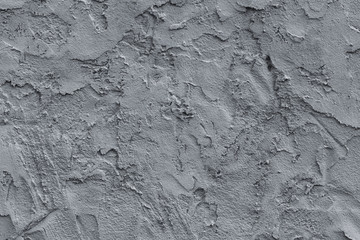 Randomly messy unevenly applied gray cement plaster. Abstract modern trendy concrete texture background
