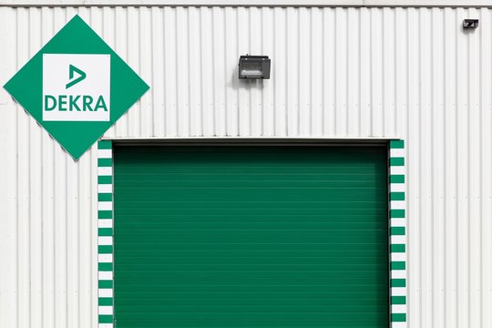 Chartres, France - June 27, 2016: Dekra garage. Dekra is a vehicle inspection company founded in Berlin, Germany in 1925. Dekra is the third largest inspection company in the world