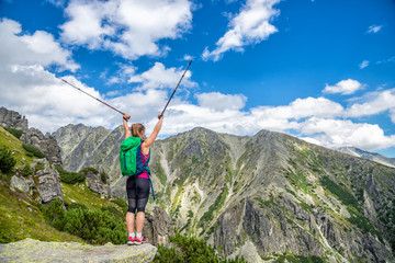 Young woman hiking in the mountains