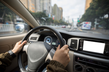 Driving car on city street during Chinese spring festival in China