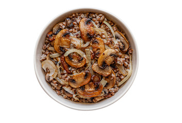 home made buckwheat porridge with mushrooms in a bowl isolated on white