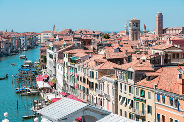 Fototapeta na wymiar Landscape and architecture of Venice from the top of Fondaco dei Tedeschi, historical city in the north of Italy in a beautiful summer day