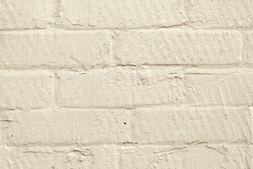 Close up of a beige brick wall. Abstract trendy modern brick texture background