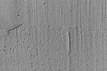Closeup surface of a gray rough concrete wall. Abstract trendy modern cement texture background