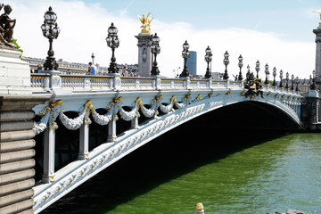 Alexander third bridge, symbol of Paris, in a beautiful summer day with blue sky, France