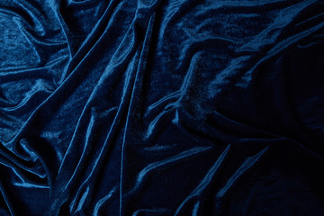 close up view of blue soft and crumpled velour textured cloth