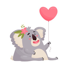 Cute holiday Koala in love with a balloon in the shape of a heart.