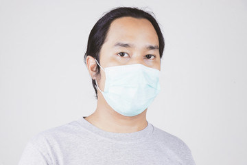 men wear face masks to protect against the covid-19 virus