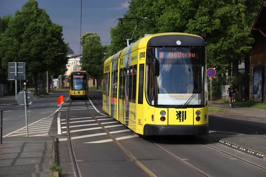 DRESDEN, GERMANY - MAY 10, 2018: Passengers ride on public transportation electric tram in Dresden. 12 tram lines are served by almost 200 trams operated by Dresdner Verkehrsbetriebe (DVB).