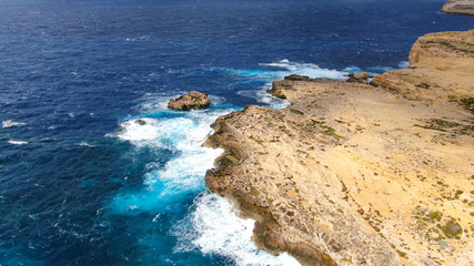 Fototapeta na wymiar Flight over Dwerja Bay at the coast of Gozo Malta - aerial photography
