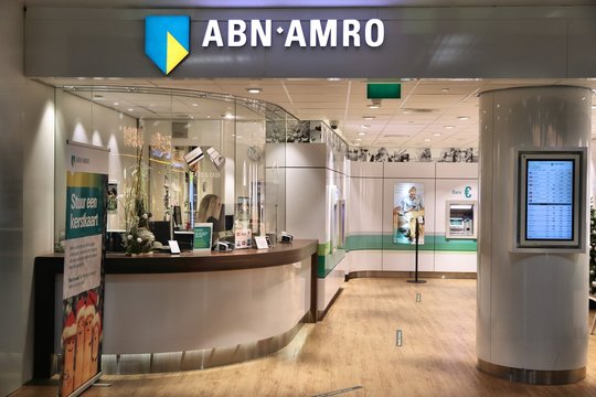 AMSTERDAM, NETHERLANDS - DECEMBER 6, 2018: ABN AMRO bank branch at Schiphol Airport in Amsterdam. ABN AMRO is the 3rd largest bank in the Netherlands.