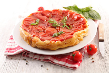 tomato quiche and basil in plate