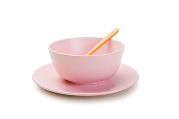 Pink ceramic plate and bowl, Empty bowl isolated on white background with clipping path