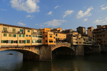 Fototapeta na wymiar Ponte Vecchio, Old Bridge, medieval stone closed-spandrel segmental arch bridge over the Arno River, in Florence, Italy