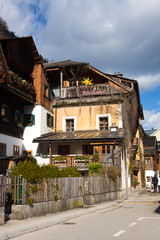 Naklejka premium Beautiful view of houses at small historical village Hallstatt. UNESCO world heritage site, old European architecture. It is famous tourist attraction in Salzkammergut region,