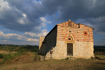 Fototapeta na wymiar Pieve dei Santi Ippolito e Cassiano, Coneo, Val d' Elsa, Tuscany, Italy