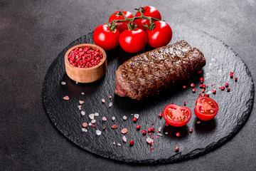 Ribeye steak with potatoes, onions and cherry tomatoes