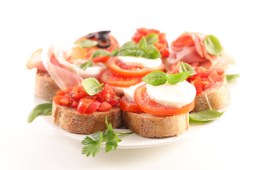 plate with assorted of canape, bruschettas