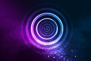 Naklejka premium Dark abstract futuristic background. The geometric shape of the cyber circle in the middle of the scene. Neon blue-pink rays of light on a dark background