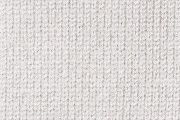 White Knitted Wool Background.