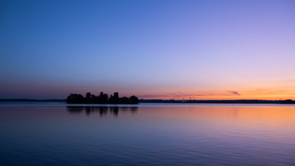 Fototapeta premium Panorama of beautiful sunrise scenery above the lake 