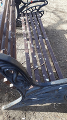 Bird poo covered park bench