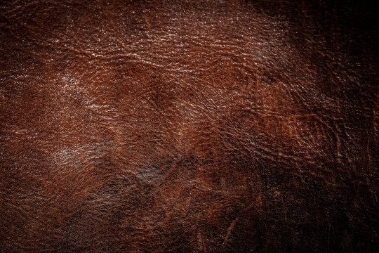 dark brown leather background or texture