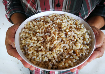 The  eggs  of  red  ants  on  white  bowl  in  Thailand.