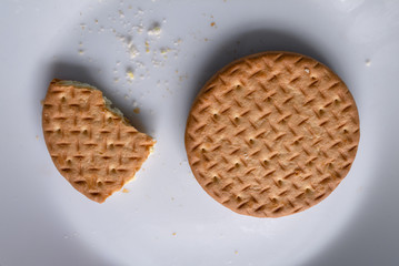 Biscuits on plate - close up, abstract composition