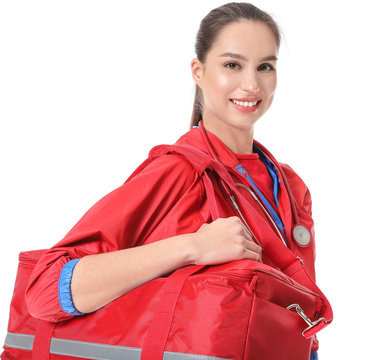 Female paramedic with bag on white background