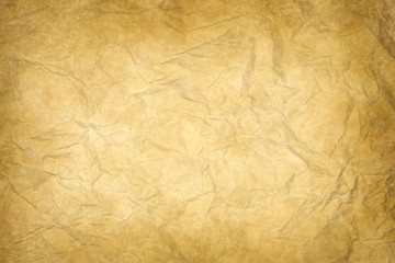 old yellowish wrinkled paper texture or background