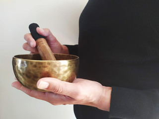 Man with a tibetan bowl