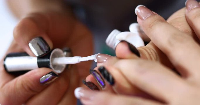 handheld shot, woman lifestyly of beauty manicure nail salon