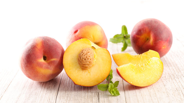 fresh peach and leaf- summer fruit