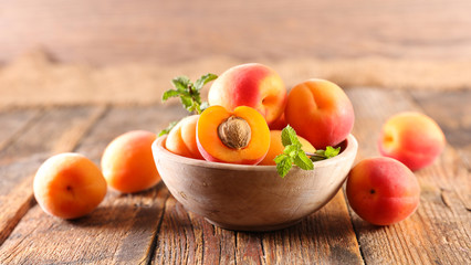 fresh apricot and leaf- summer fruit - obrazy, fototapety, plakaty