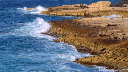 Blue water at the coast of Malta - travel photography