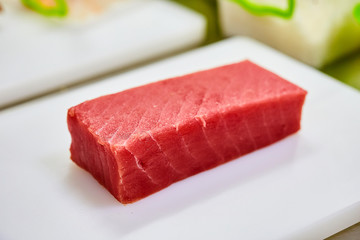 Steak of  Tuna Fish Fillet on a cutting board - Fish and Seafood