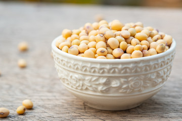 Soy bean in bowl on  wooden floor