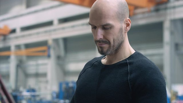 Engineer working with smart app on tablet