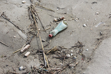 plastic bottle waste on beach