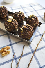 vegetarian raw materials healthy diet without baking candy balls dessert sweets gluten-free sugar free with coconut, proper nutrition snack on a white background