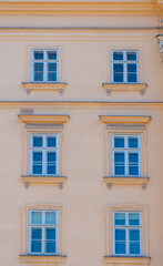 Fototapeta na wymiar Windows in old buildings. Historical houses in Vienna. Wien. Austria. Europe