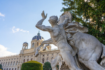 Fragment of sculpture of man taming a rearing horse (Rossebandiger 1892)  on Maria Theresa square...