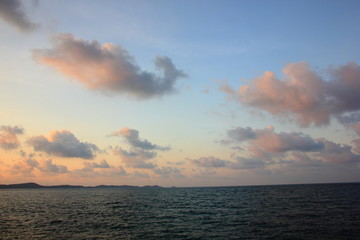 Clouds and morning sky on the sea.white clouds over the tropical sea at sunset.