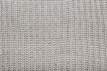 Fototapeta na wymiar texture of woolen knitted fabric