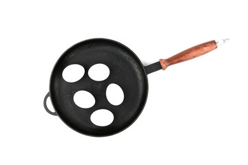 5 eggs are on the pan on white background top view with copy space
