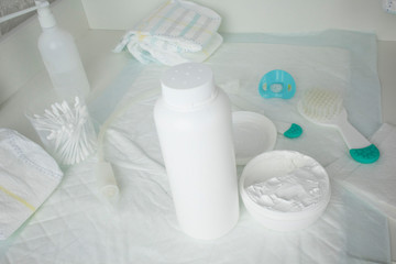 changing table and baby care products-powder, cream, pacifier, diapers
