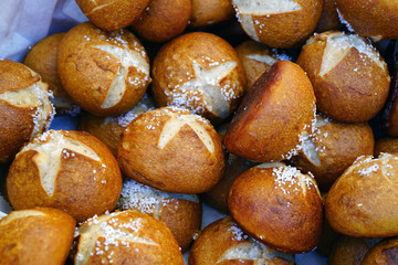 Pretzel bread rolls with salt
